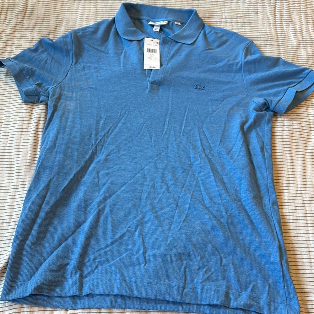Blue lacoste size large with original tags